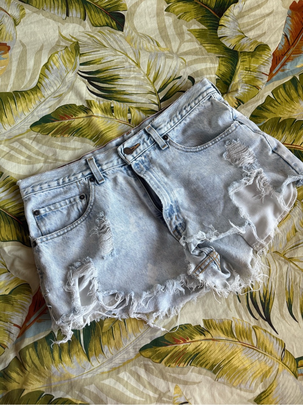 Levi’s Distressed Light Wash Denim Shorts